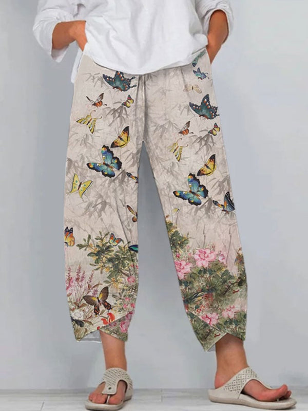 Pantalones casuales con bolsillo estampado de flores de mariposa para mujer 